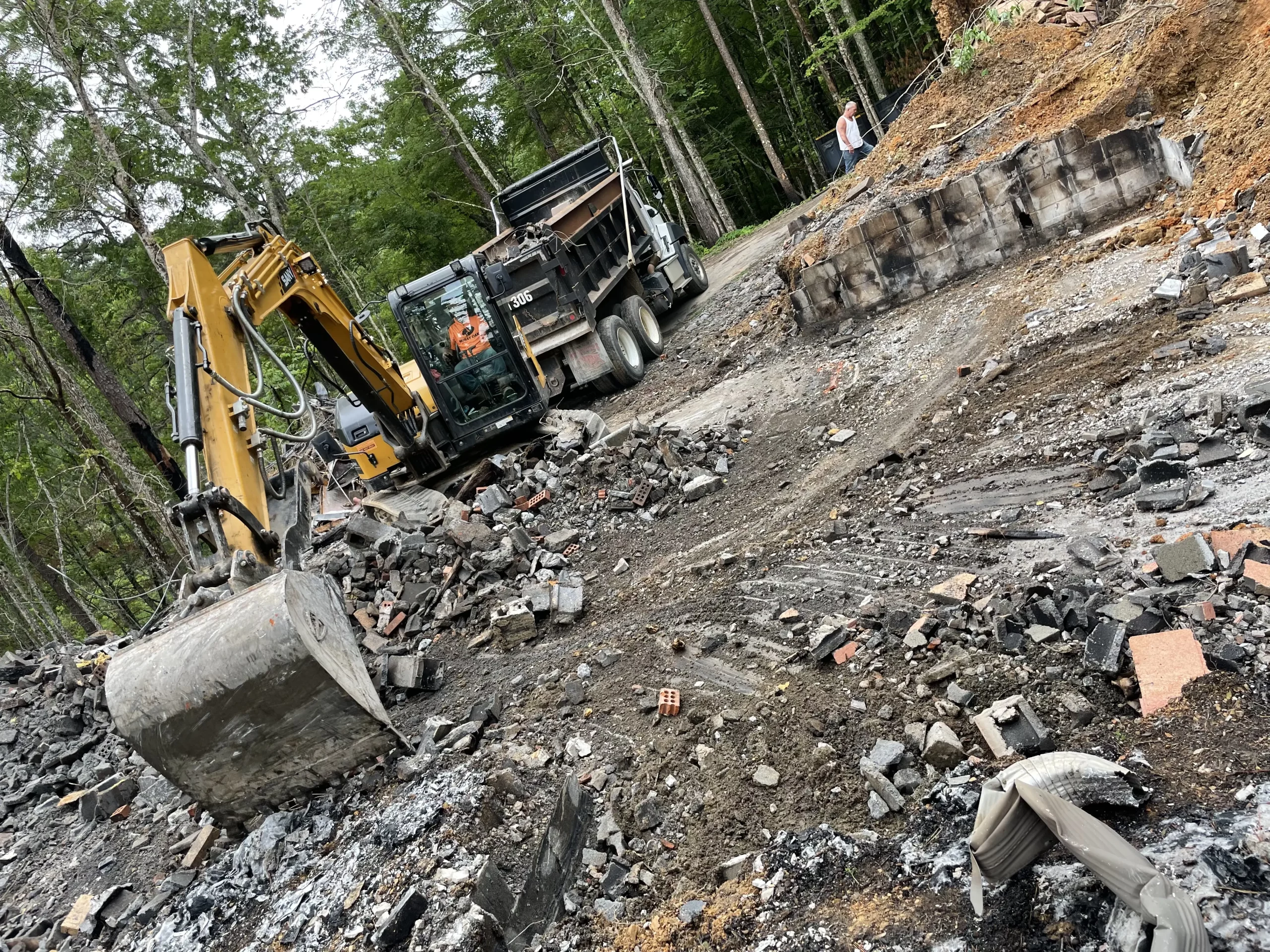 heavy machine clearing rock away